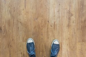 Blue Chucks in Non Slip Wooden Floor
