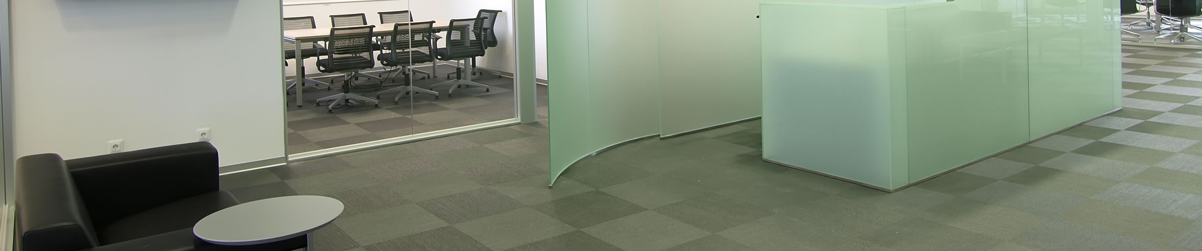 Office Hallway with View of Conference Room  and Commercial Carpet